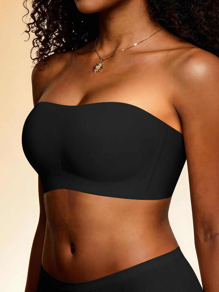 Black strapless bandeau bra styled with gold necklace side view
