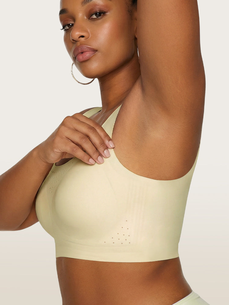 asyBunny Perforated Minimizer Bra Sage Green – Wireless Seamless Side Close-Up Breathable Perforated Holes Arm Raised Dark Skin
